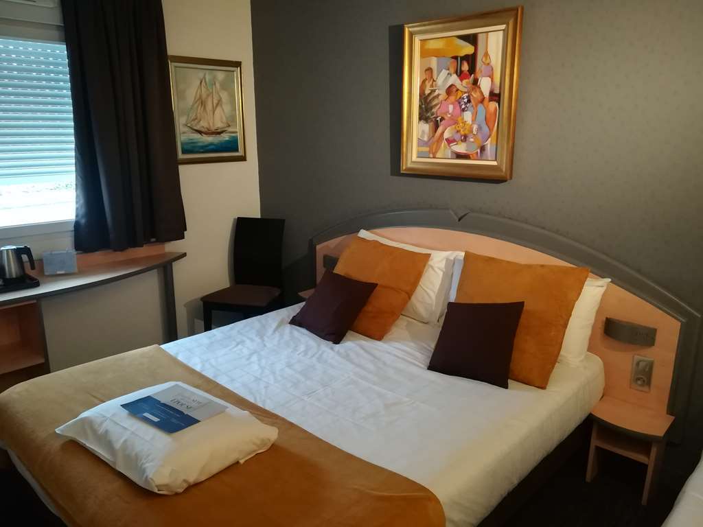 Hotel Kyriad Brive Ouest Стая снимка